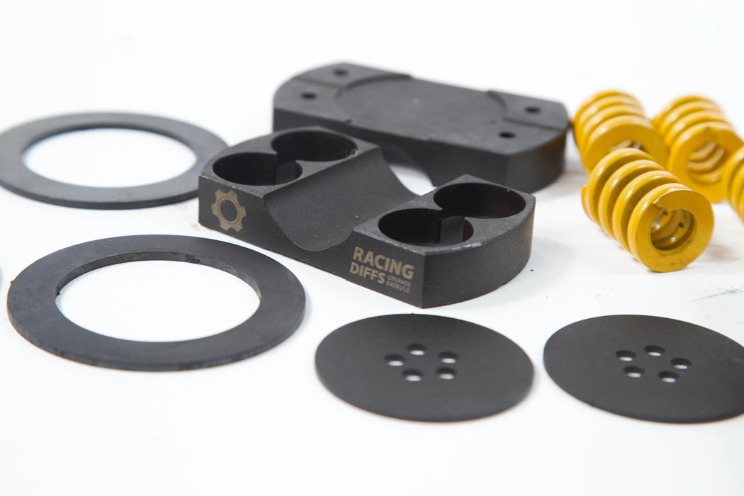 RacingDiffs LSD conversion kit components for Alfa Romeo M32 and C630 gearbox showing springs friction plates and locking blocks